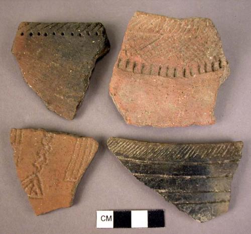 4 decorated pot sherds