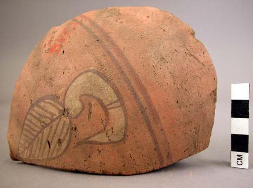 Potsherd of smooth hard red ware, painted with leaf design