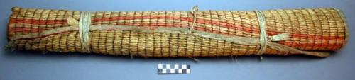 Large oblong bag made of elaeagnus with hemp twine and edged with buckskin.