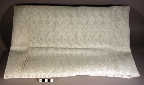 Huipil material, uncut, white. white with white design woven in. 92 x 102 cm.