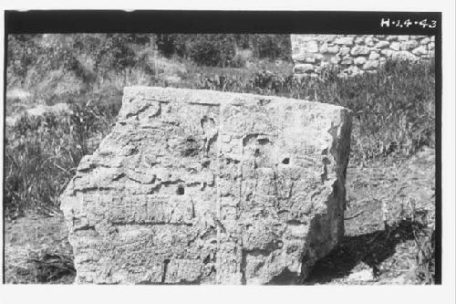 Front of stela fragment near bottom