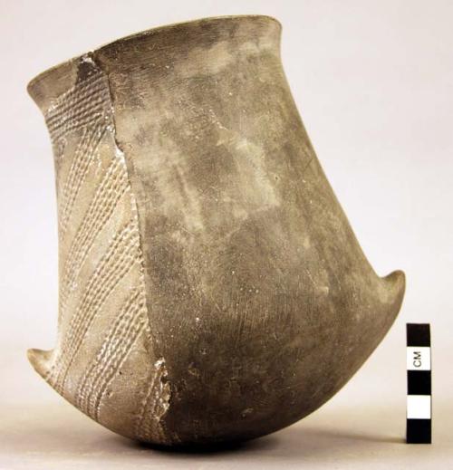 Deep pear-shaped pottery vessel