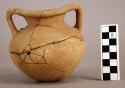 Medium-sized pottery jar with constricted neck and two handles - Armadillo ware