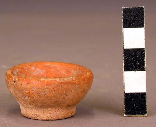 Pair of miniature red pottery bowls