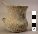 Small handled pottery cup