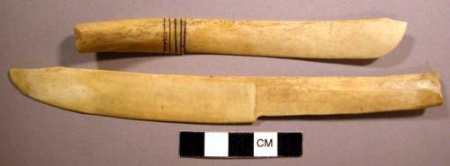 Bone knives with incised lines