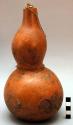 Narrow mouthed gourd container