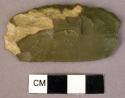 Stone artifact, green grey chert or flint?  One surface slightly convex, also fl