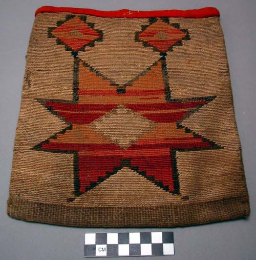 Cornhusk bag. Colored designs on both sides