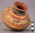 Pottery jar, base red, upper zone white with black ornamentation