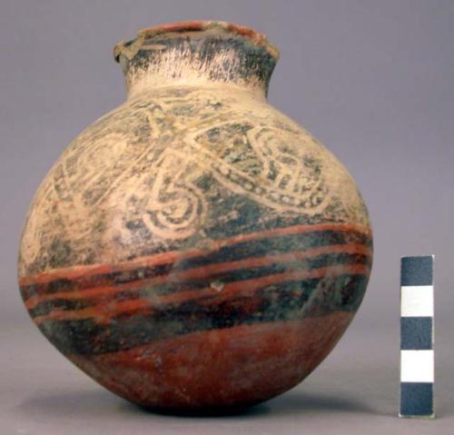 Pottery jar, base red, upper zone white with black ornamentation