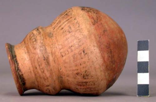 Small, gourd-shaped vessel