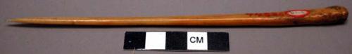 Awl, worked bone, one end tapered to point, plain, slightly concave at one end