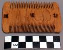 2 wooden combs; 3 3/4 x 2 1/4"