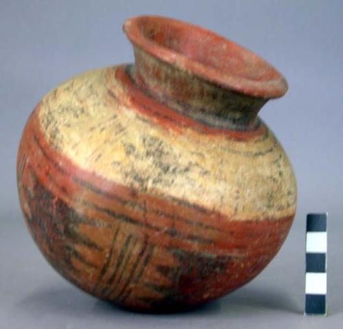 Pottery jar, red, with black ornament on base + white band