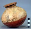 Pottery jar, base red, upper zone white with black ornamentation