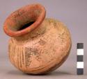 Pottery jar, base red, upper zone white with black ornamentation