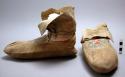 Pair of skin moccasins decorated with porcupine quills