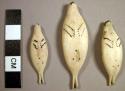 3 carved bone seal figures