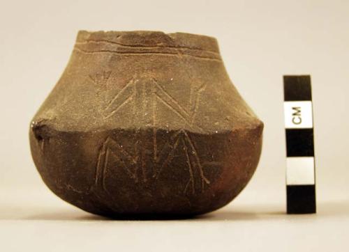 CAST of stroked pear-shaped pottery vessel with engraved frog figure