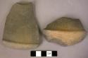 12 potsherds - black fluted ware (decorated)