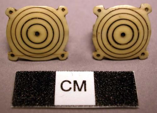 Ivory earrings-incised, blackened concentric circles