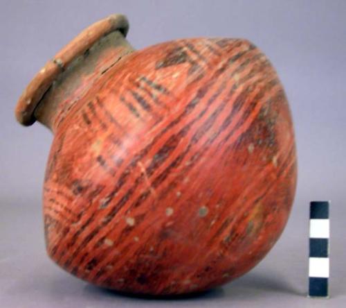 Large pottery jar with constricted neck - restored negative painted