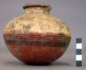 Pottery jar, red base, upper zone with black ornamentation