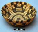 Coarse weave basketry bowl. Geometric pattern.