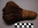 Brush for cleaning baskets, made from soap root