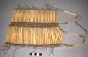 Sioux hair pipe breast plate. 2 sections of 32 hair pipes each. Hide strip down
