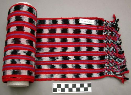 Man's sash (pas) for pants.  Red and purple stripes with stripes of blue and whi