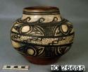 Jar, polacca polychrome style b. Zuni rain bird design. 16.2 x 18.9 cm.