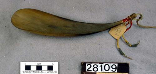 Spoon from buffalo horn with leather decoration on handle.