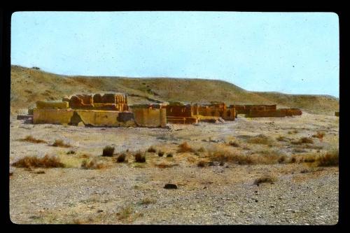 Lantern slide of ruins from a distance, hand-colored