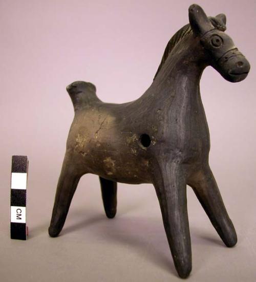 Ceramic, black burnished horse figurine/whistle