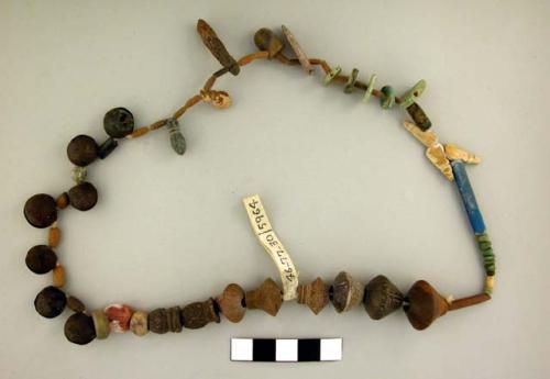 Necklace made of pottery, copper, stone, shell and glass beads