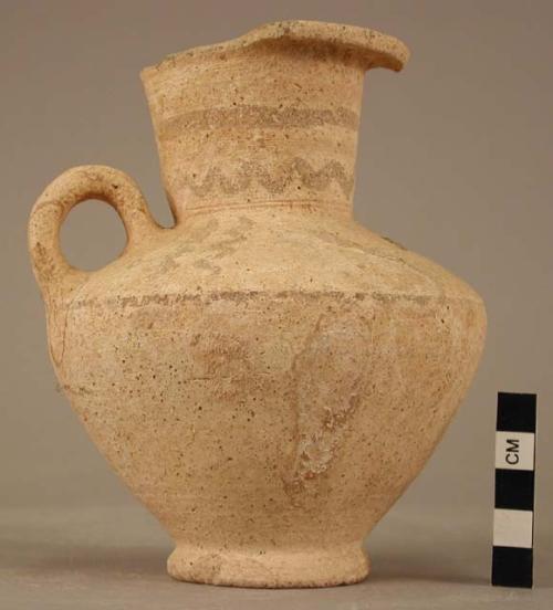 Pottery jar with one handle; red and black polychrome;