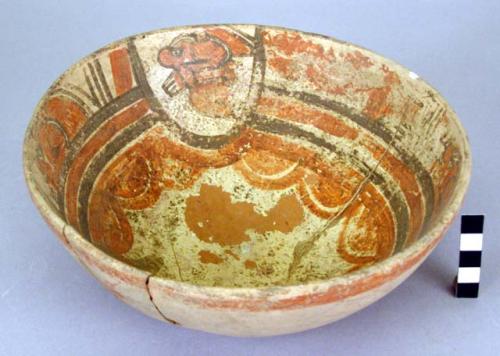 Highland polychrome pottery bowl with painted designs on inside of bowl