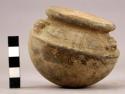 Small incised adorno-decorated pottery vessel