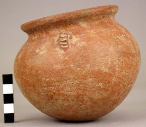 Small red pottery bowl with handles