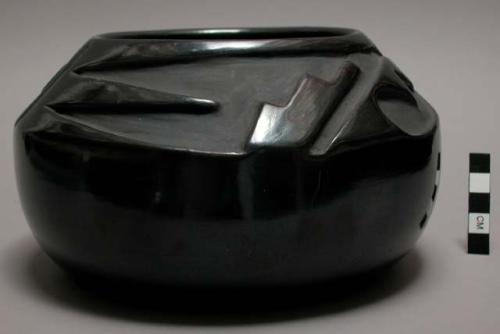 Carved blackware jar