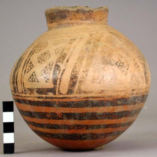 Pottery jar, base red, upper zone white with black ornamentation