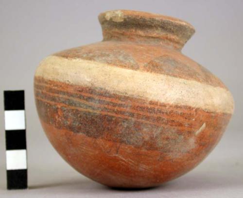 Pottery jar, red, with white band and black ornamentation