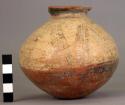 Pottery jar, base red, upper zone white with black ornamentation