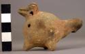 Pottery bird effigy whistle. Light brown, probably faded from red.