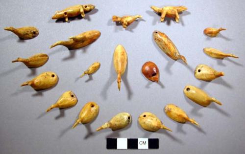 Small ivory or bone figures for game