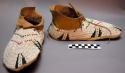 One pair of moccasins--top ornamented with beaded pattern