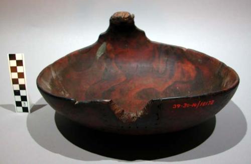 Large wooden bowl with effigy head