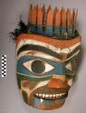 Carved and painted wooden mask
